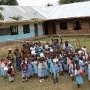The children of the  Kindergarden in front of the school-building.